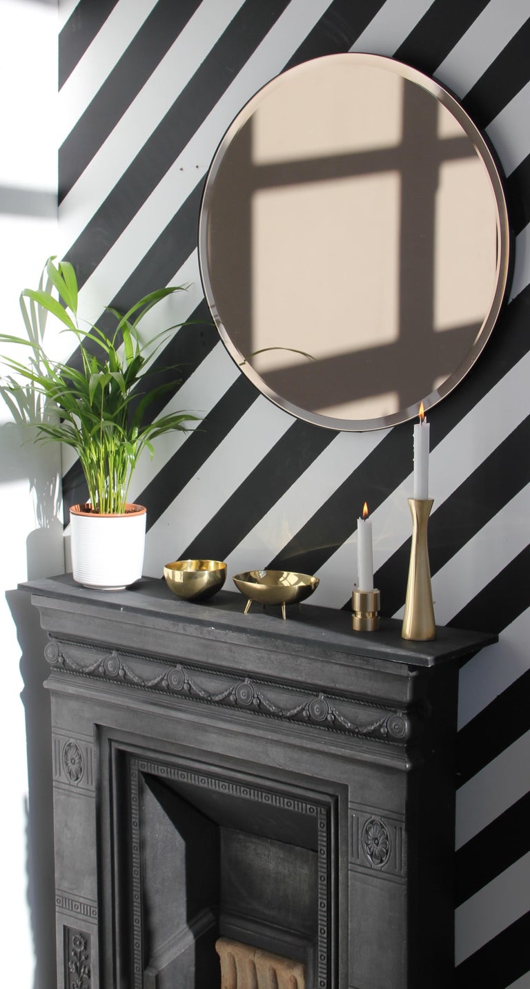 Orbis Beveled Bronze Tinted Round Elegant Mirror with a Black Frame