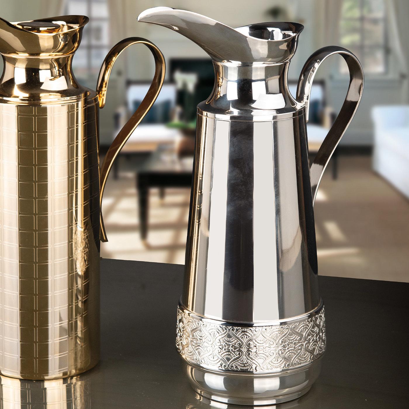 Best showcased alongside the Beverage Gold Pitcher from the same collection, this stupendous pitcher merges classic and modern styles in a timeless and versatile silhouette of unparalleled refinement. Handmade of brass, it is finished with