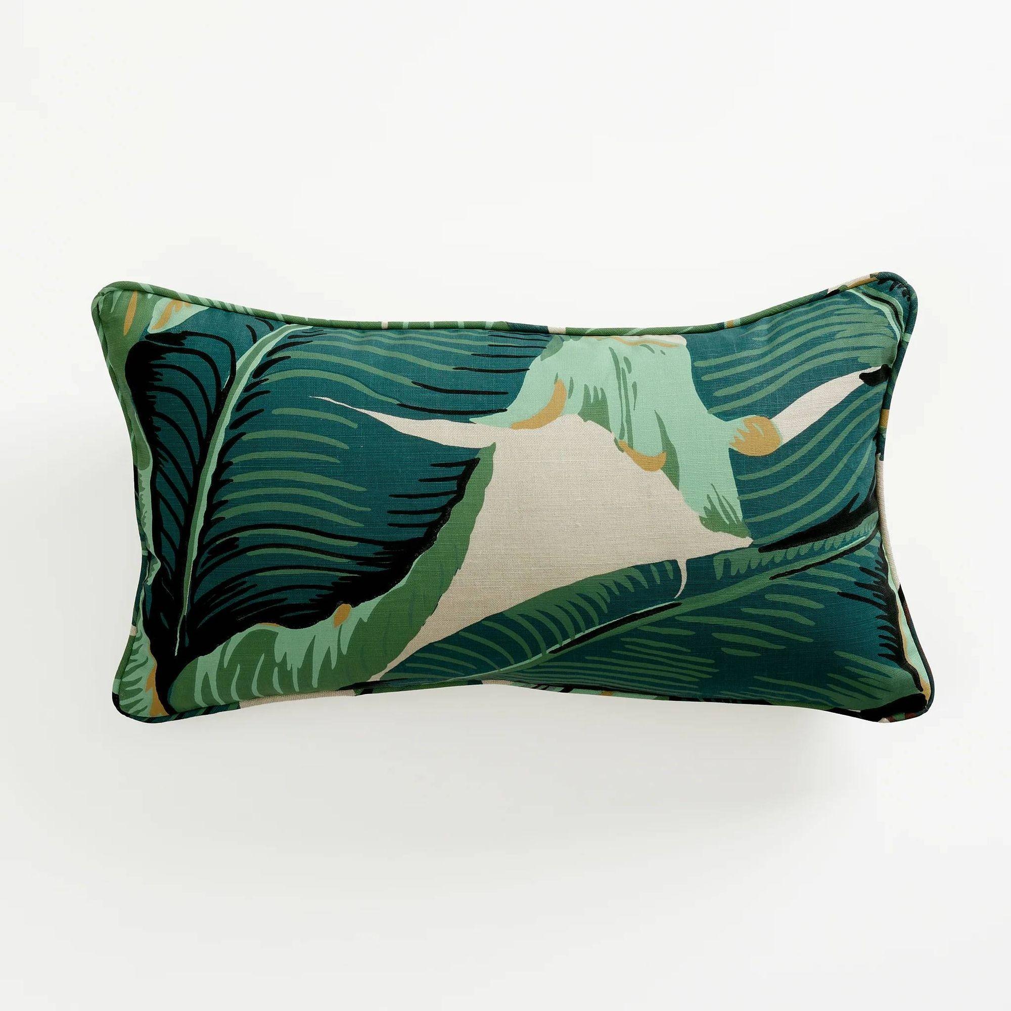 Add a touch of timeless Hollywood glamour to your home decor with this unused throw pillow, featuring the iconic Martinique Banana Leaf fabric from The Beverly Hills Hotel. Hand-screened and painted by the original manufacturer in Los Angeles, this