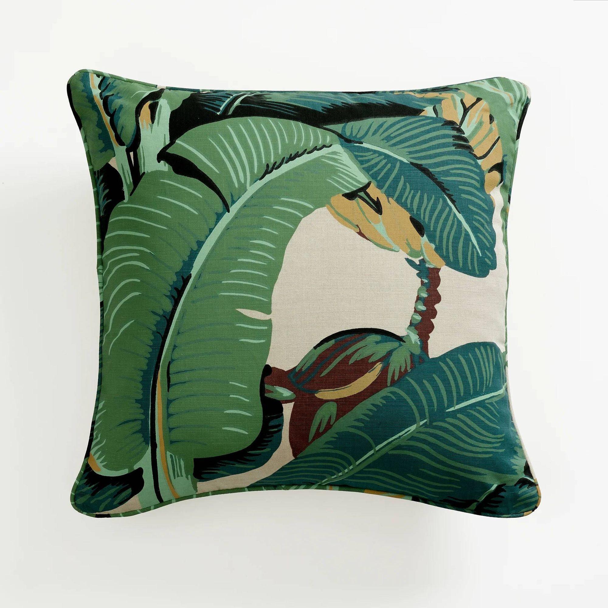 Add a touch of timeless Hollywood glamour to your home decor with this unused throw pillow, featuring the iconic Martinique Banana Leaf fabric from The Beverly Hills Hotel. Hand-screened and painted by the original manufacturer in Los Angeles, this