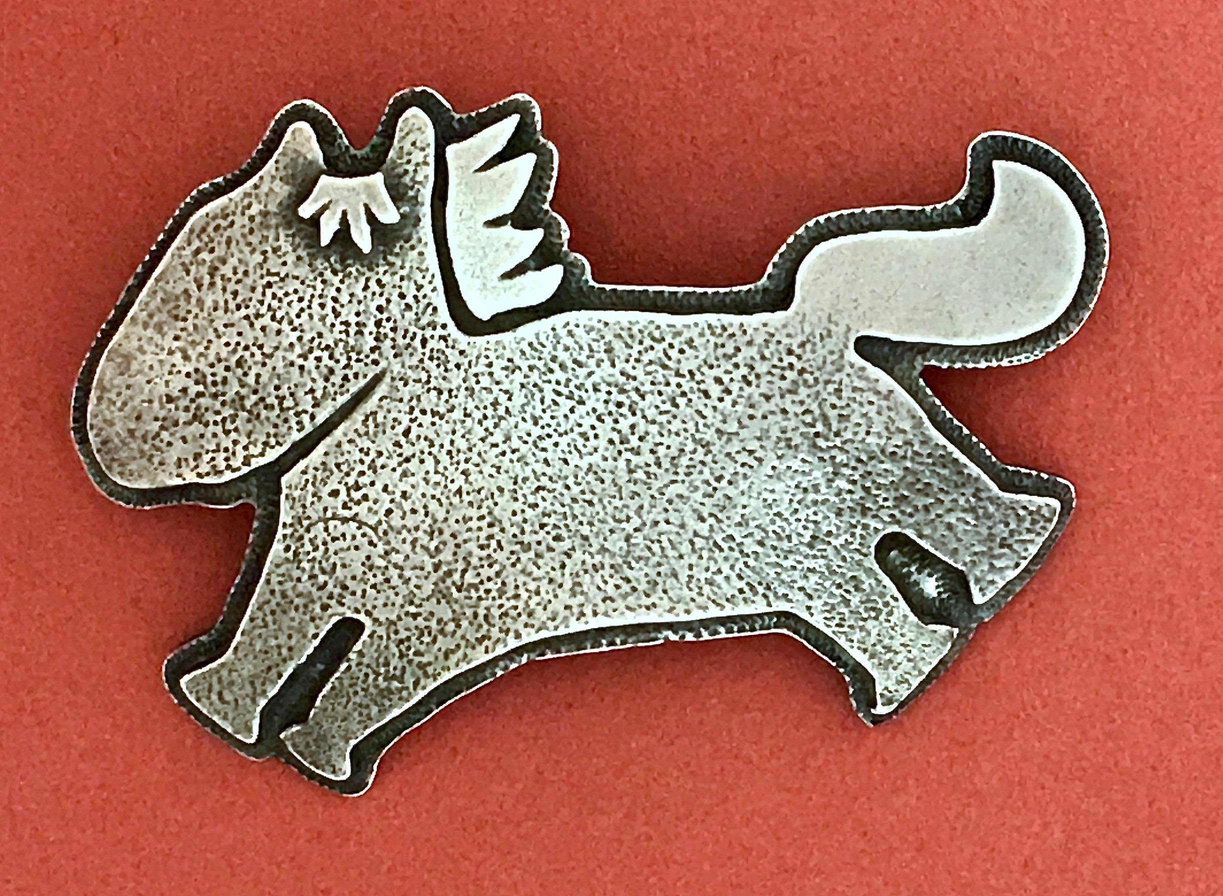 Beverly Hills Yazzie, sterling silver pendant Melanie Yazzie Horse Navajo
Also available with a pin back. Contact us for information.

Wearable art jewelry designs by internationally known printmaker, sculptor, and painter. 
Cast and hand-finished