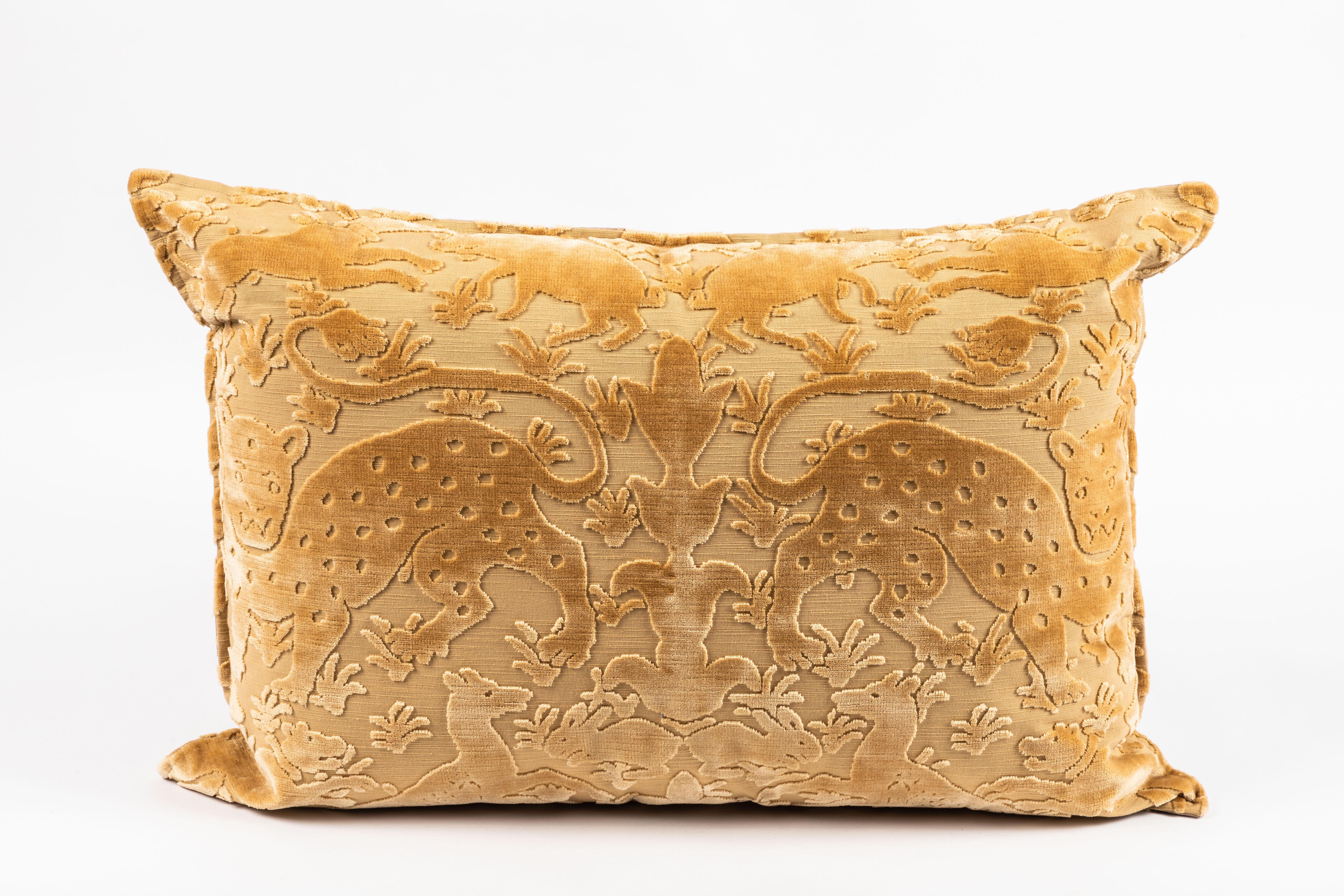 Pillow made from Bevilacqua's Bestiario handcut cotton viscose gold velvet (50/50), featuring an animal motif. 

The roots of the Bevilacqua family in the textile world date back to 1499. The actual Tessitura in Venice was founded by Luigi