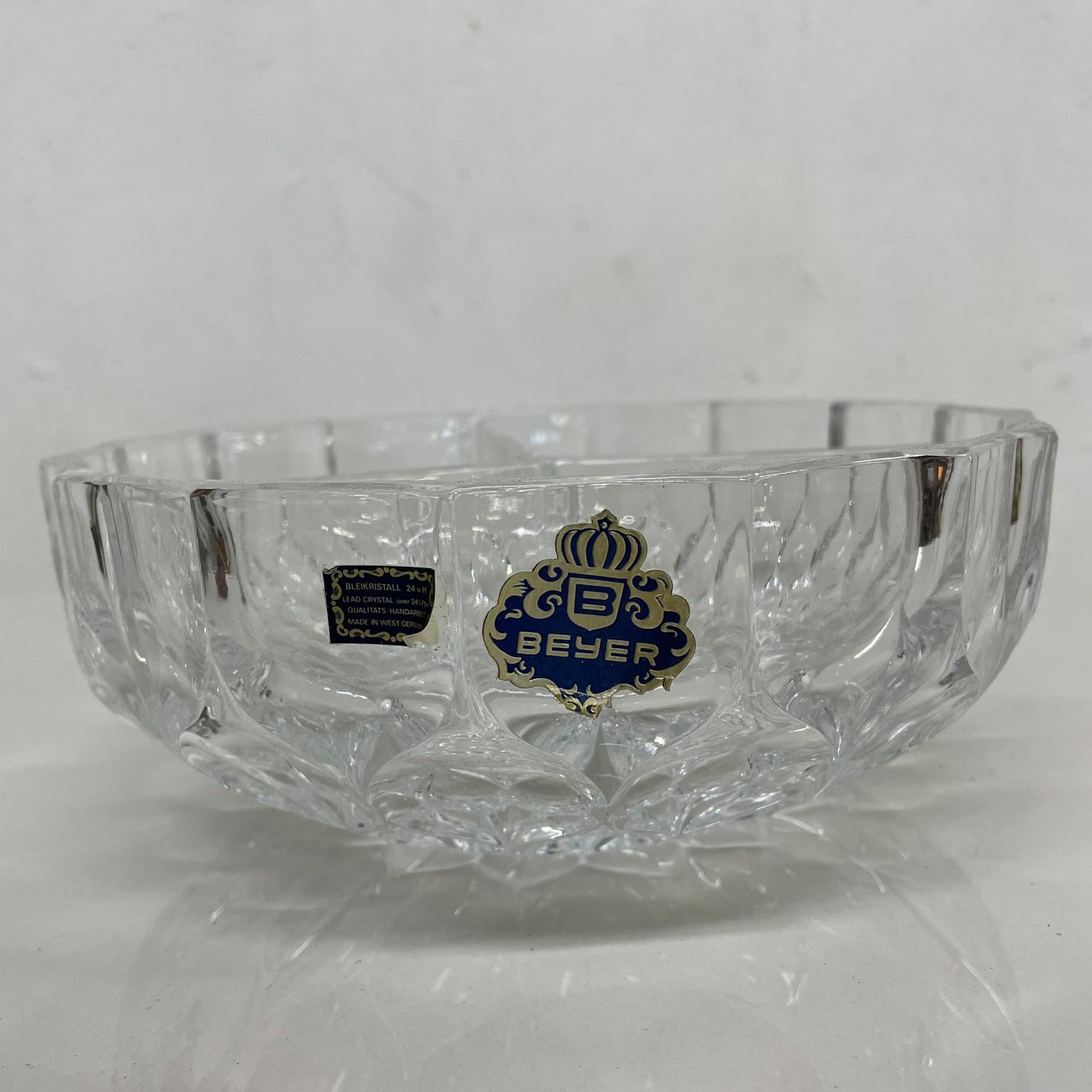 Crystal Dish
Beyer Bleikristall from Germany crystal sectioned bowl serving dish 
Measures: 8.13 x 3 H inches
Preowned unrestored vintage condition, refer to images.
Maker label is present.

