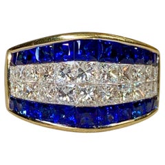 Anillo de cóctel «Bez Ambar» de 18 quilates con un cuatrillón de diamantes y zafiros azules intensos en estilo «Illusion»