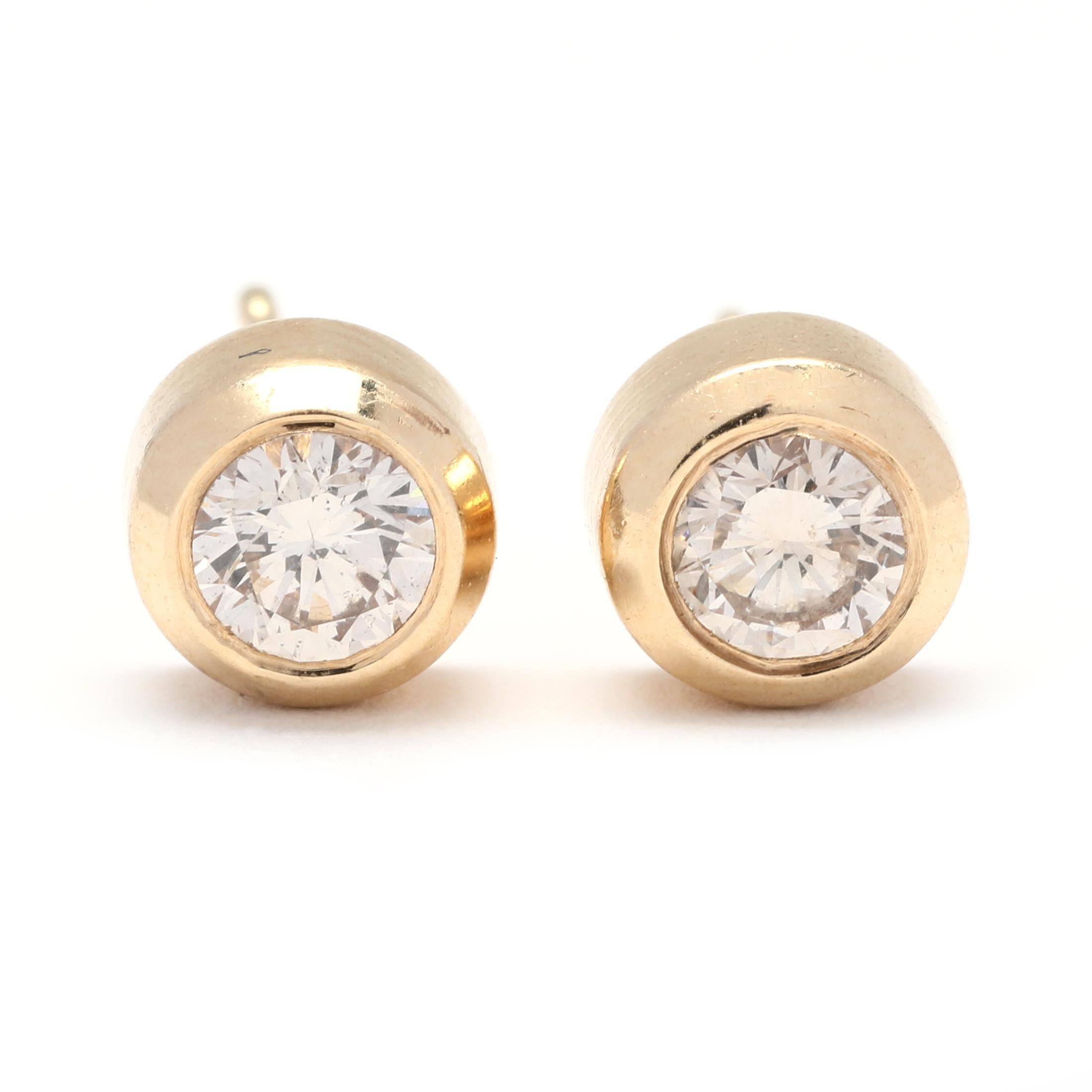 Stones:
- diamonds, 2 stones
- round brilliant cut
- 4 mm
- approximately .50 total carats
- H-I color, SI2-I1 clarity

Length: 6.25 mm

Weight: 1.3 dwts. / 2 grams

Stamps: 14K BH

A Couple Of Things to Note:
* This is a vintage item and may show