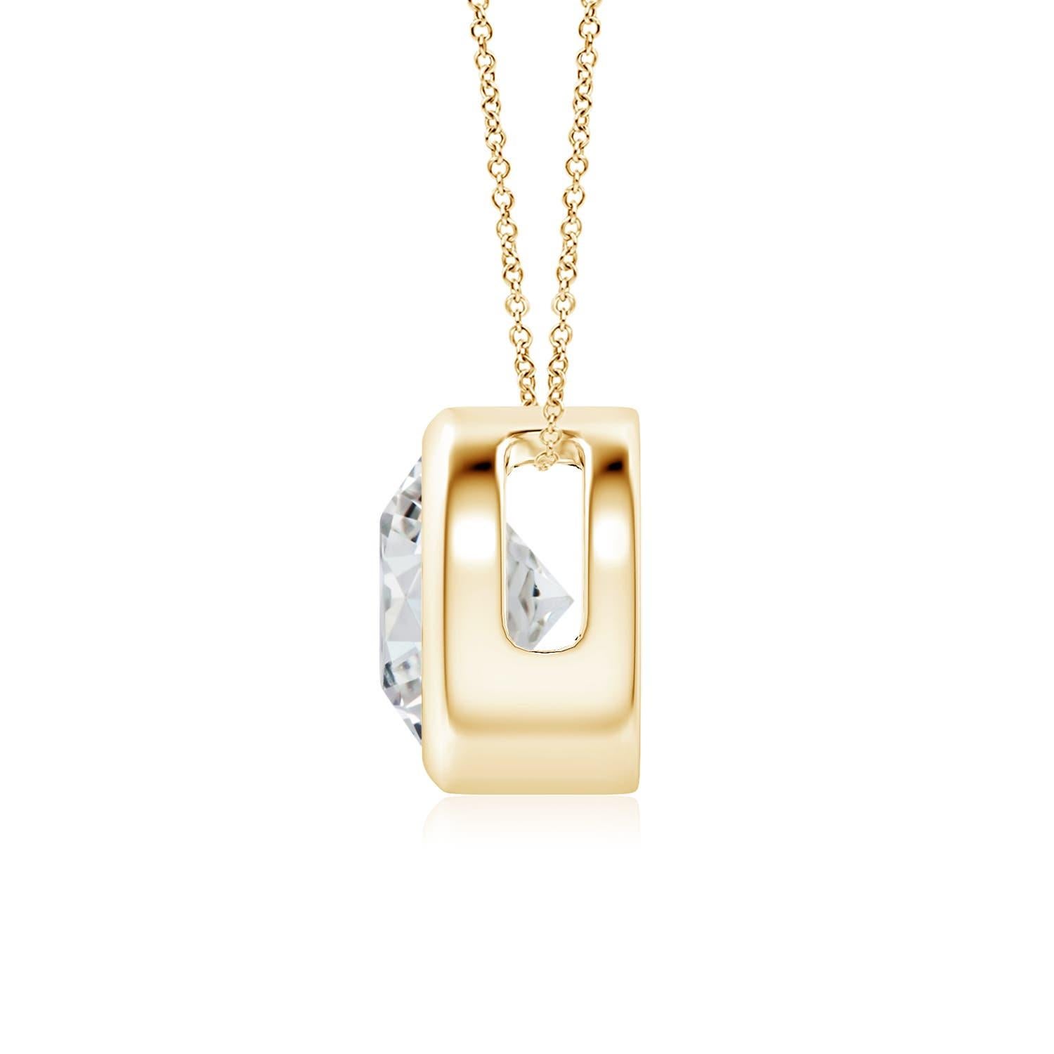 This classic solitaire diamond pendant's beautiful design makes the center stone appear like it's floating on the chain. The sparkling diamond is secured in a bezel setting. Crafted in 18k yellow gold, this round diamond pendant makes an elegant