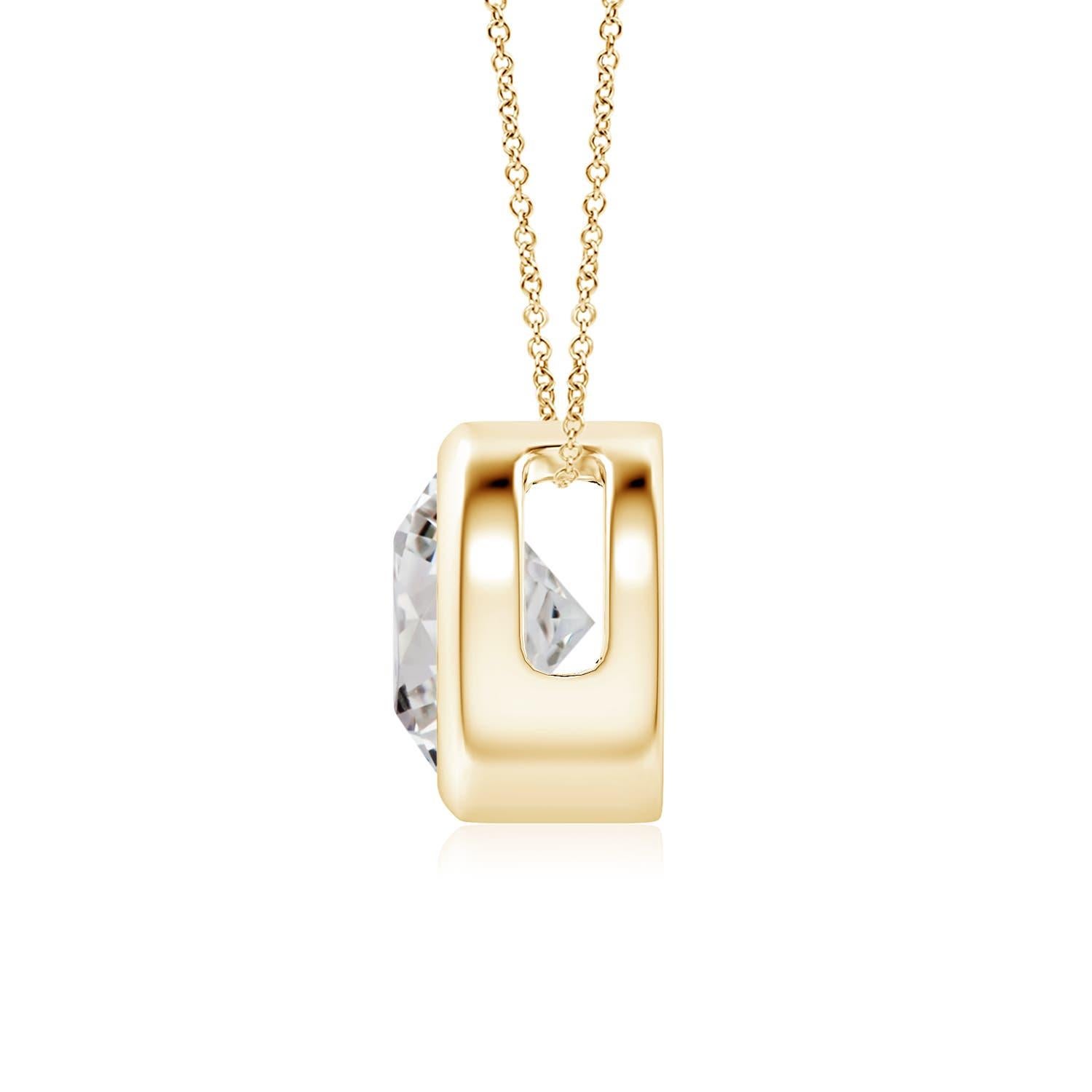 This classic solitaire diamond pendant's beautiful design makes the center stone appear like it's floating on the chain. The sparkling diamond is secured in a bezel setting. Crafted in 18k yellow gold, this round diamond pendant makes an elegant