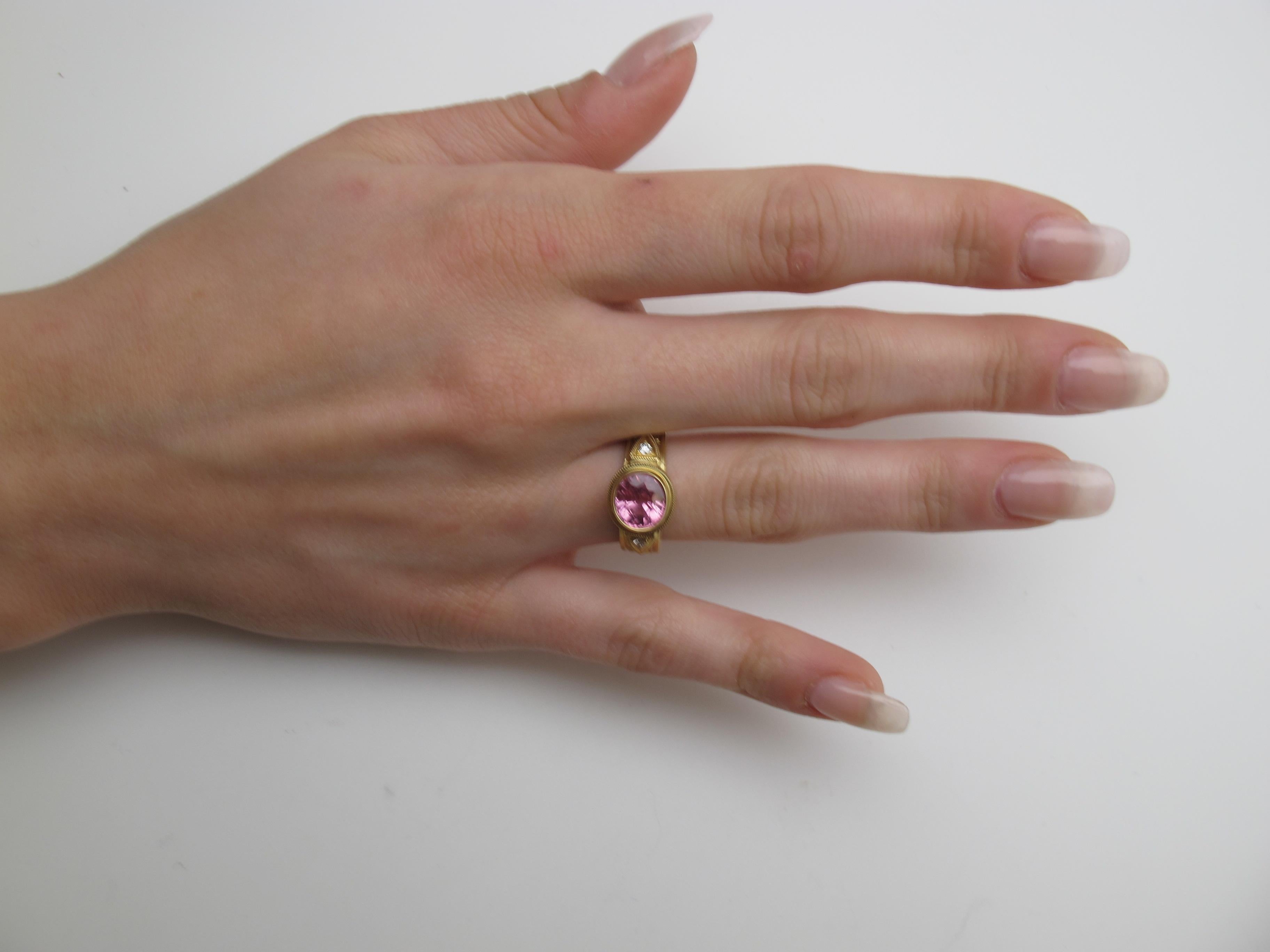 Oval Cut Bezel Set 2.28 Carat Pink Spinel and Diamond 18 Karat Gold Hand Engraved Ring