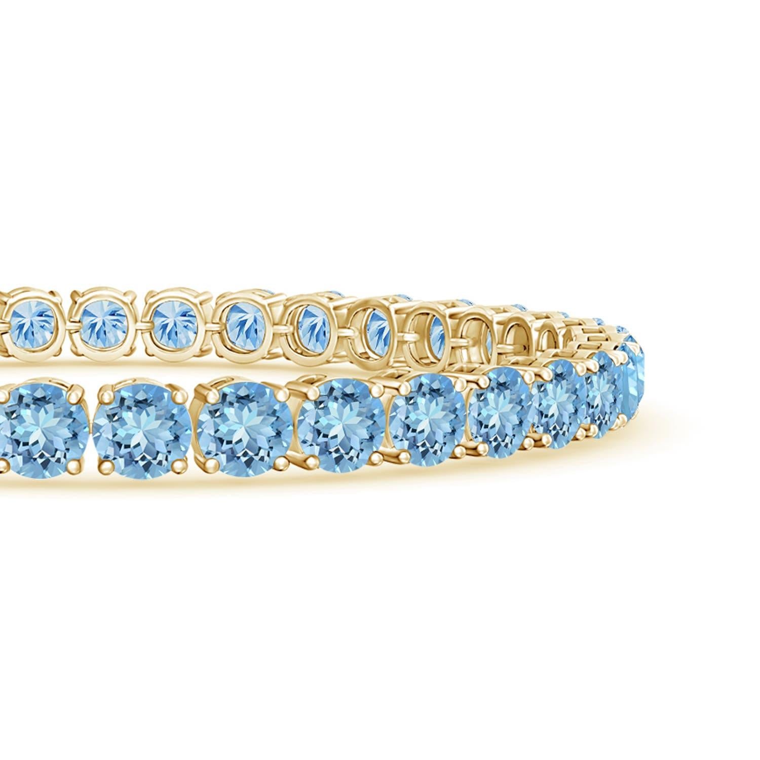 Simple yet so appealing, this tennis bracelet in 14k white gold is effortlessly elegant. The alternated round diamonds and icy blue aquamarines are secured in bezel settings.