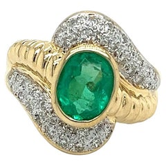 Bezel Set 2.80 Carat Oval Cut Emerald & Diamond Ribbed Textured 18K Gold Ring