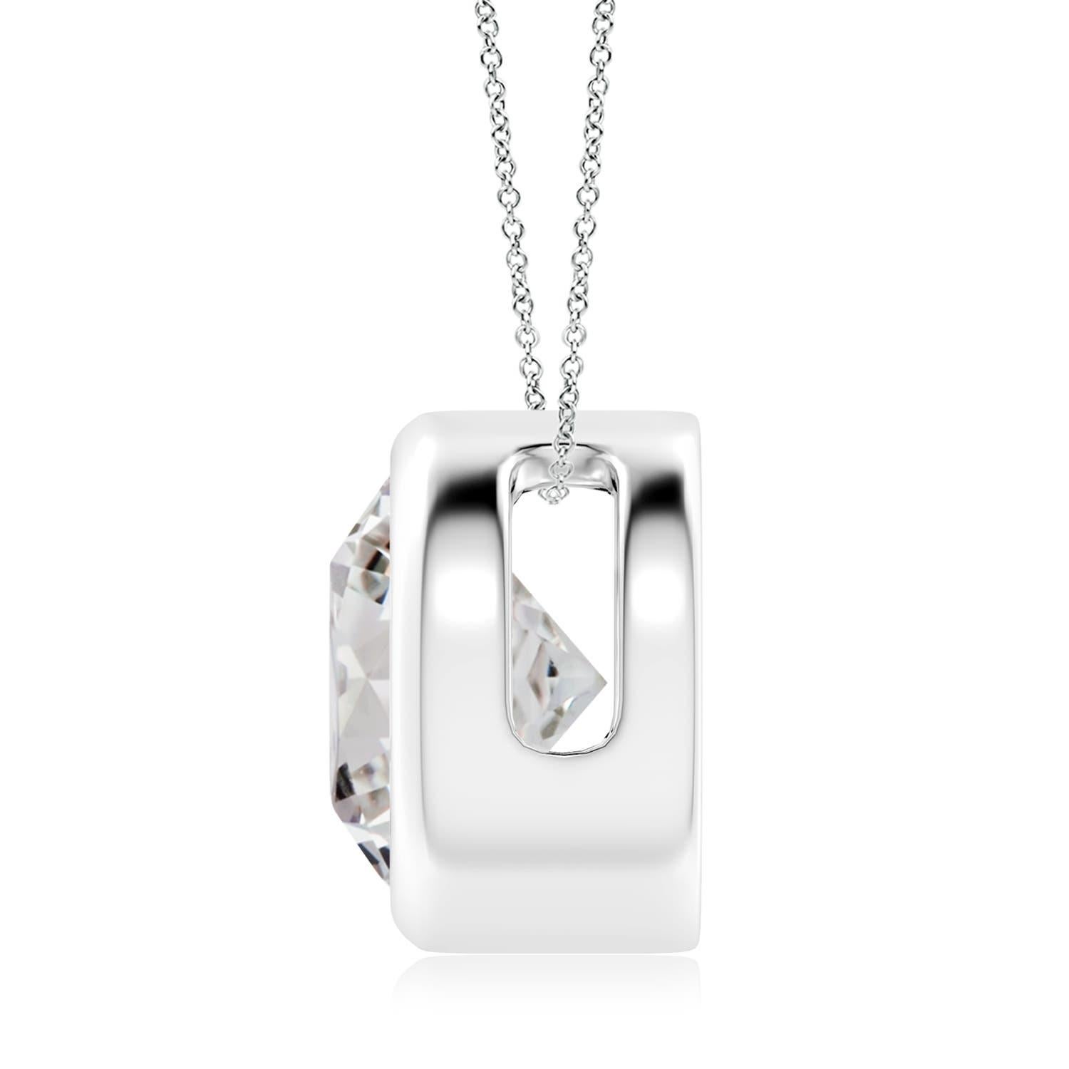 This classic solitaire diamond pendant's beautiful design makes the center stone appear like it's floating on the chain. The sparkling diamond is secured in a bezel setting. Crafted in 14k white gold, this round diamond pendant makes an elegant