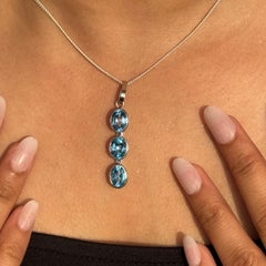Bezel Set 7.49 CTW Blue Topaz Three Stone Linear Silver Pendant Luxury Gift