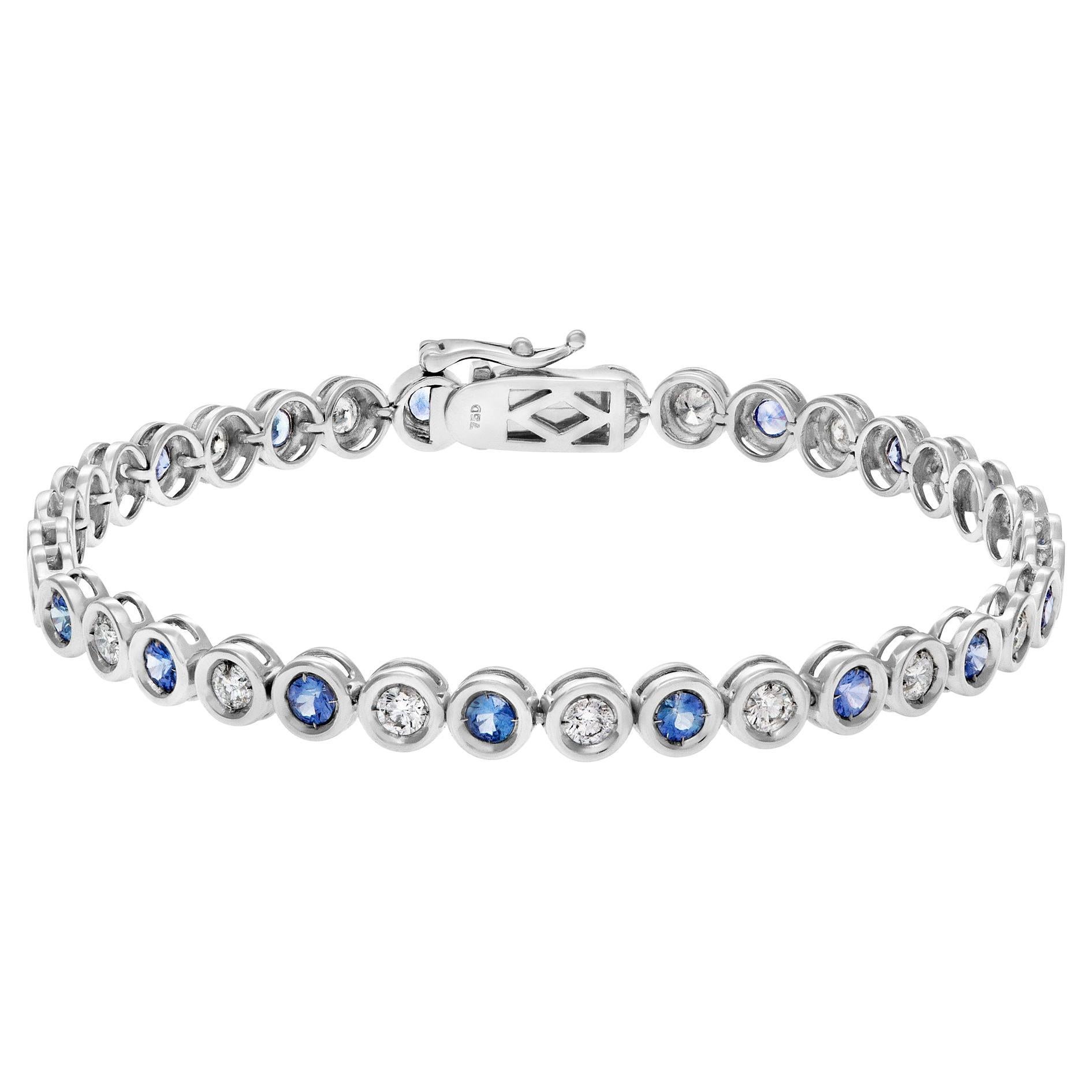 Bezel Set Blue Sapphire and Diamond Line Bracelet in 18k White Gold For Sale