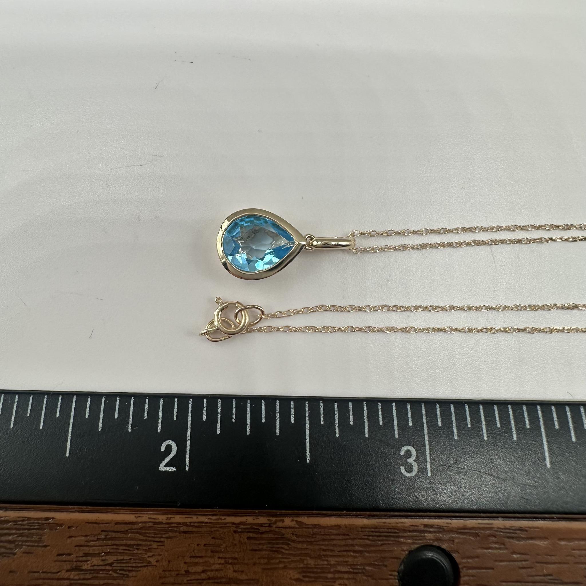 Bezel Set Blue Topaz Necklace in 14kt Yellow Gold - 8x6mm Pear Cut, 18