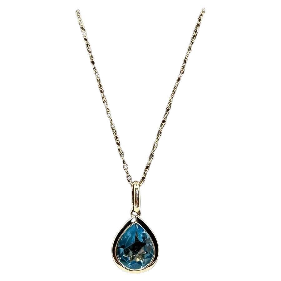 Bezel Set Blue Topaz Necklace in 14kt Yellow Gold - 8x6mm Pear Cut, 18" en vente