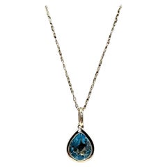 Bezel Set Blue Topaz Necklace in 14kt Yellow Gold - 8x6mm Pear Cut, 18"