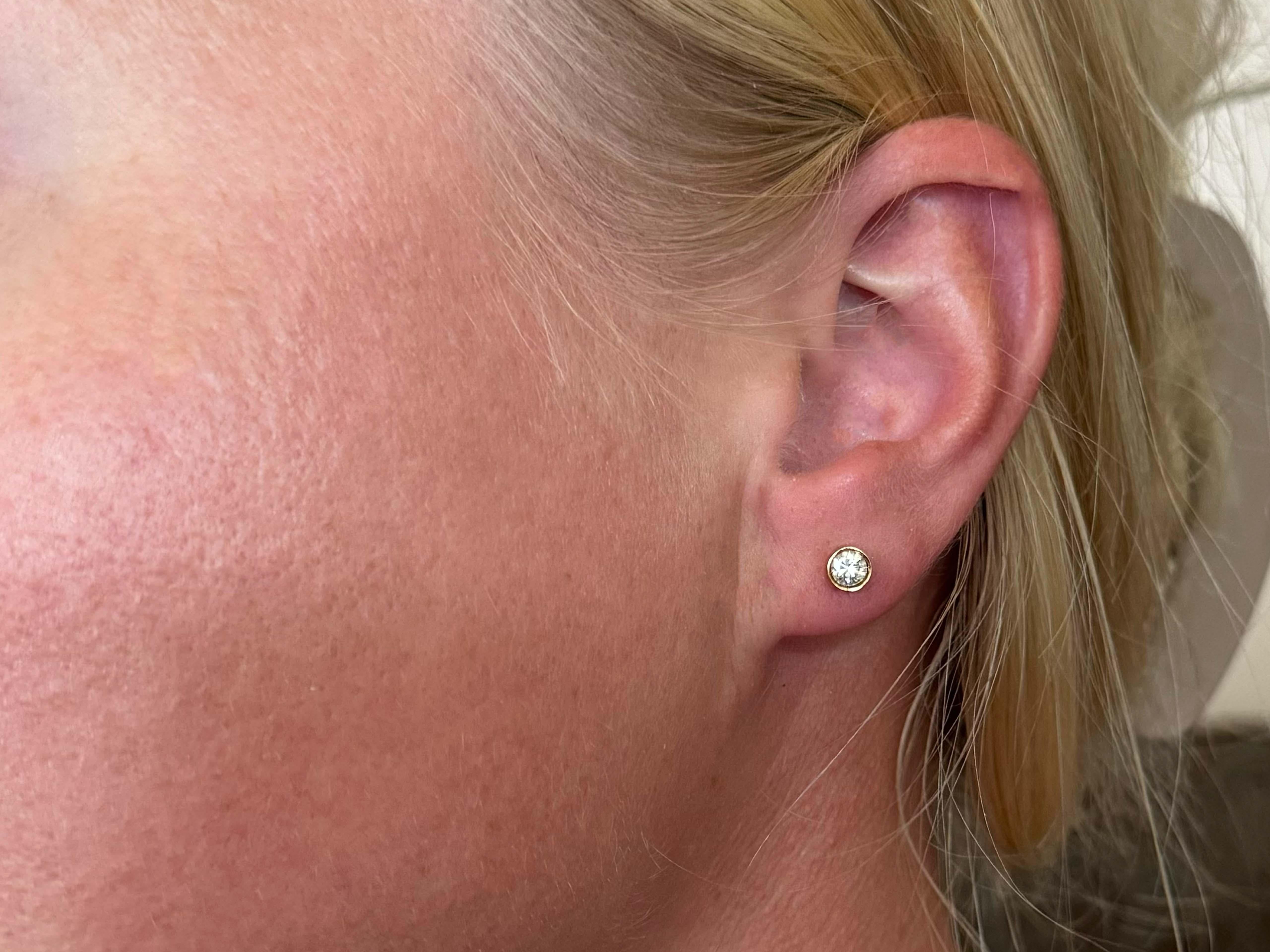Earrings Specifications:

Metal: 14k Yellow Gold

Total Weight: Grams

Diamond Carat Weight: ~0.60 carats

Diamond Color: G-H

Diamond Clarity: VS2-SI1

Condition: Preowned, excellent

Stamped: 