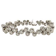 Bracelet bulle de diamants en or blanc 14 carats serti clos