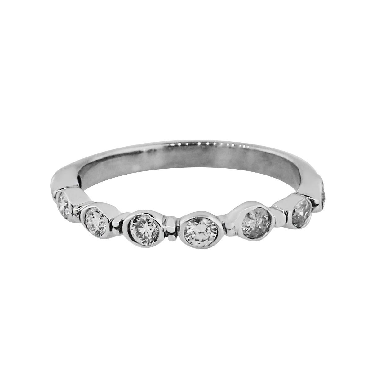 Material: 18k White Gold
Diamond Details: Approximately 0.40ctw round brilliant bezel set diamonds. Diamonds are G/H in color and SI in clarity
Ring Size: 6.75
Item Weight: 2g (1.3dwt)
Measurements: 0.75″ x 0.11″ x 0.75″
SKU: R4971