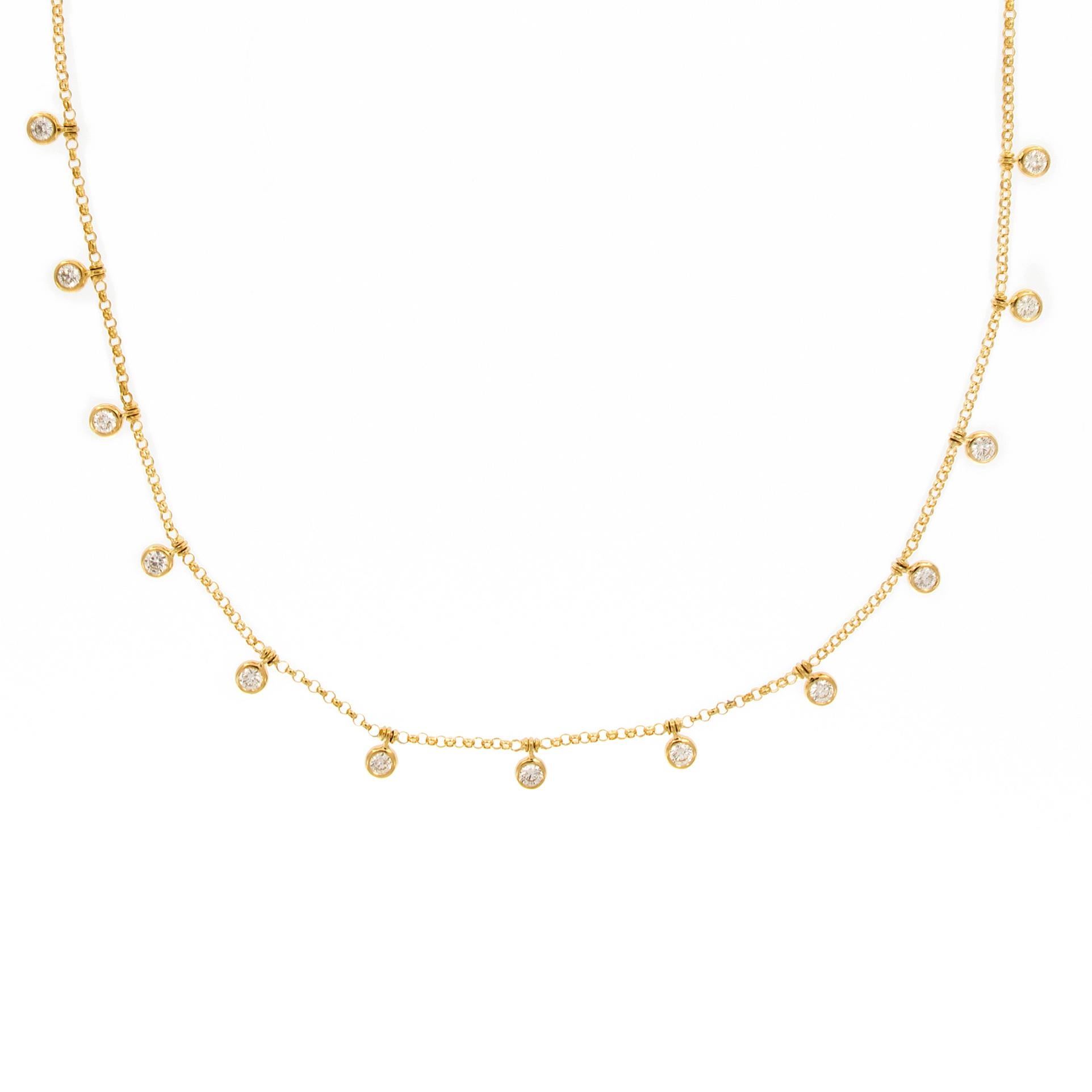 This necklace provides a touch of sparkle and sway. 18k yellow gold necklace features 13 bezel-set round brilliant-cut diamonds that dangle from an 16-1 7 inch chain. Weighs 6.5 grams.

Diamonds 1.04 cttw