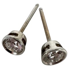 Bezel set diamond earrings 14KT white gold 0.55ct 1.10 grams studs Natural