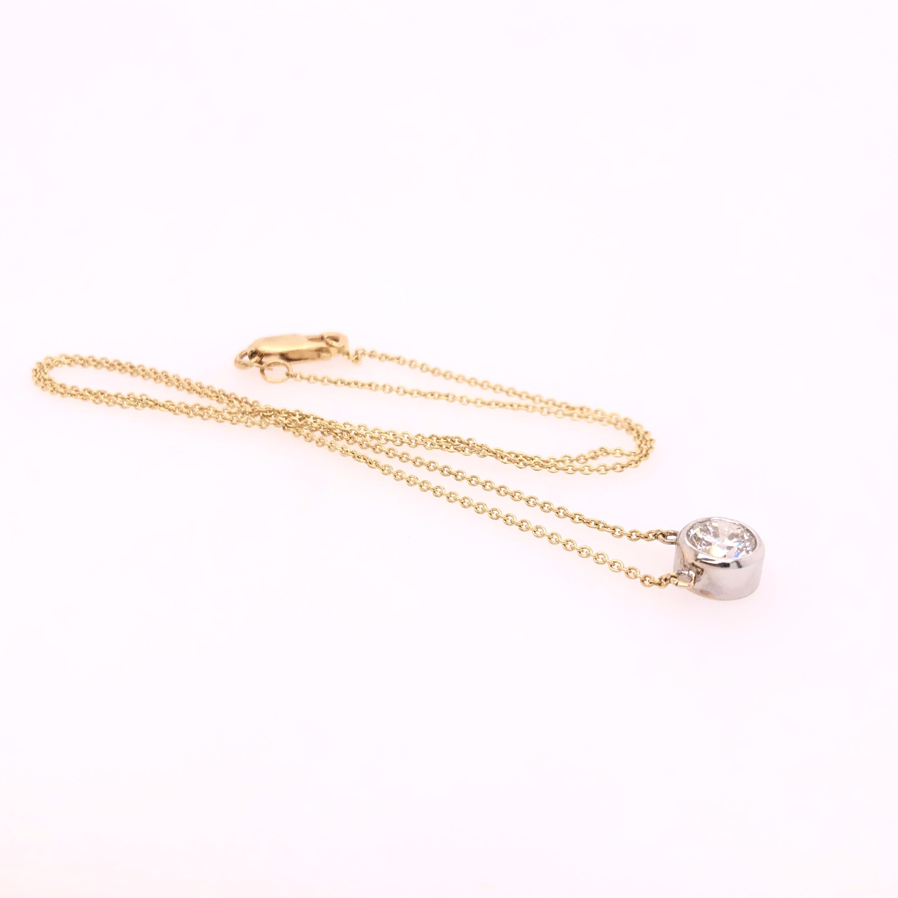 Round Cut Bezel Set Diamond in White Gold with Yellow Gold Chain