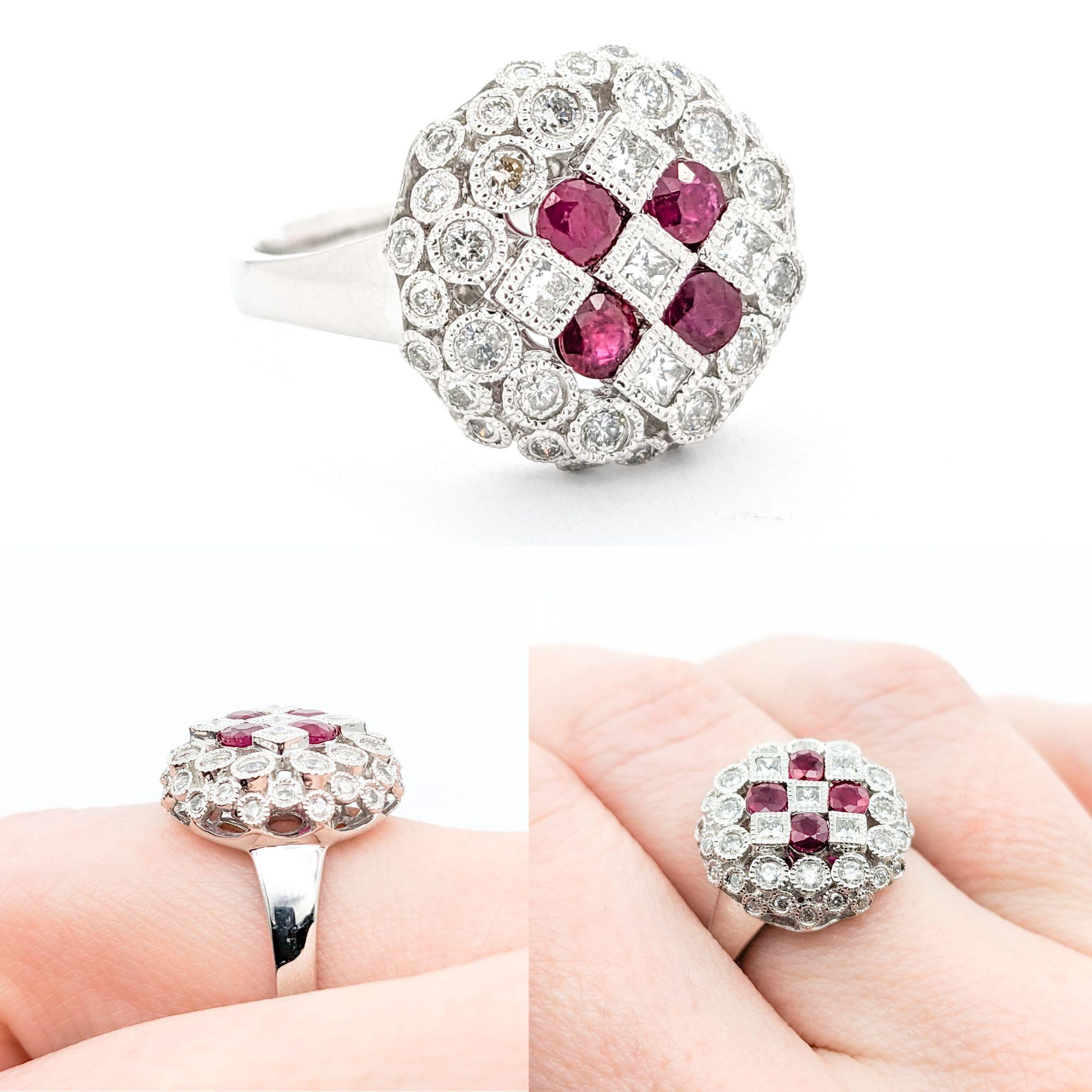 Diamond & Rubies Ring In Platinum

Introducing this lovely Ruby and Diamond Ring, beautifully crafted in platinum. This statement ring features a stunning centerpiece of Rubies totaling .66ctw. The Rubies are beautifully complemented by .70ctw of