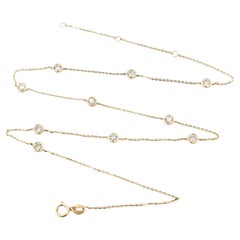 Collier station en or jaune 14k avec diamants sertis sur lunette