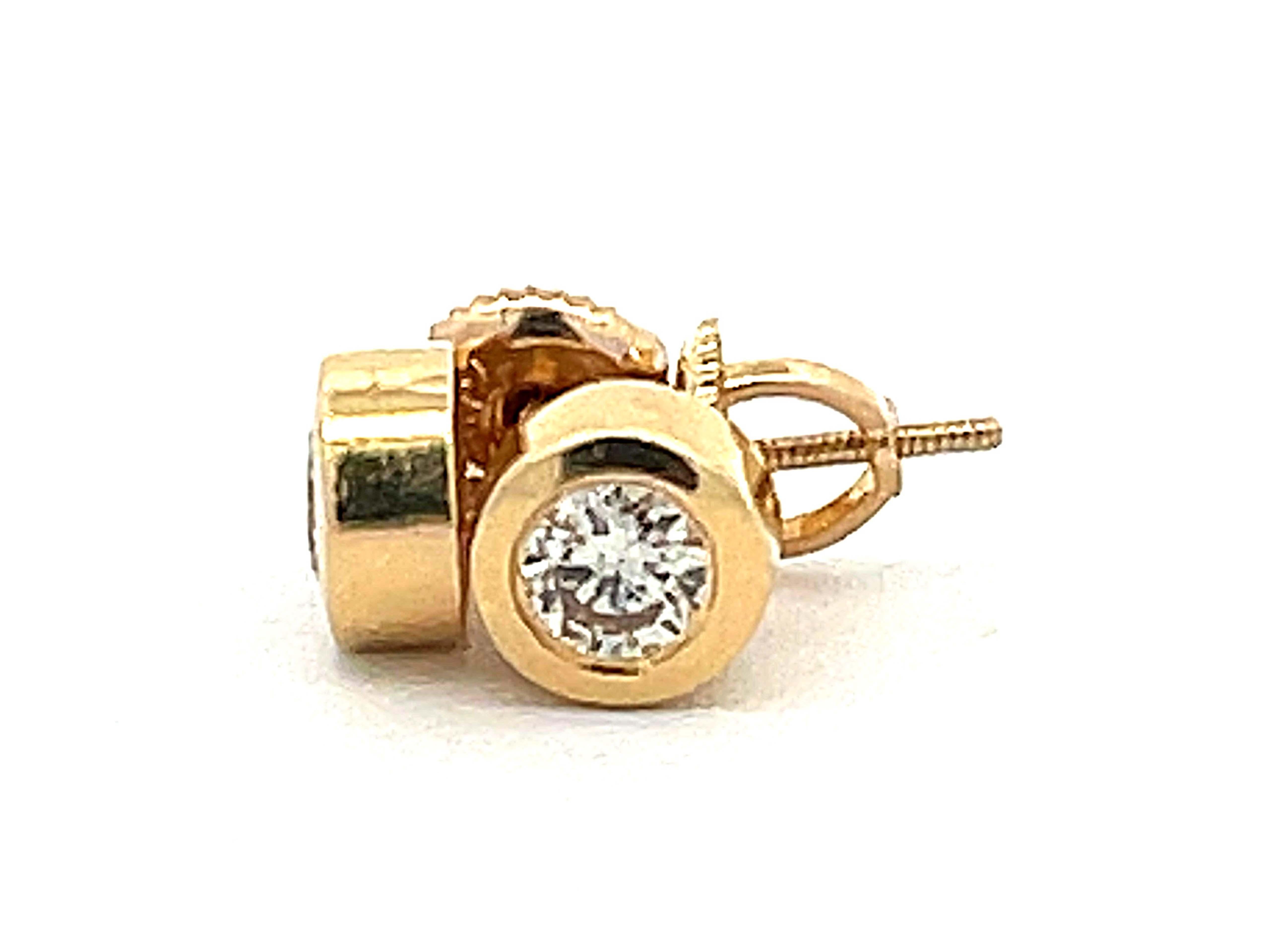 Brilliant Cut Bezel Set Diamond Stud Earrings in 14k Yellow Gold For Sale