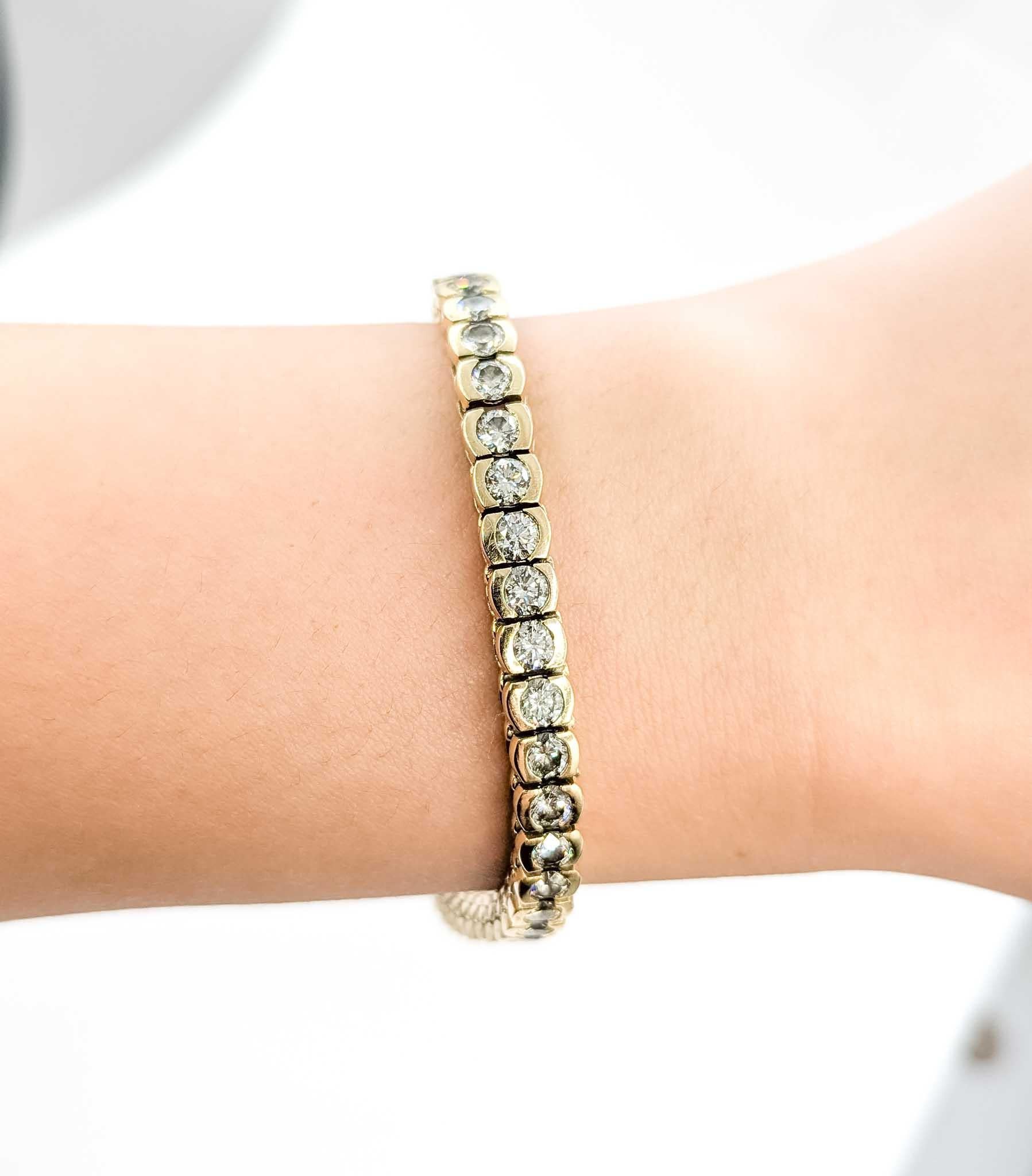 Pulsera de tenis con diamantes engastados en bisel en oro amarillo de 14k Corte redondo en venta