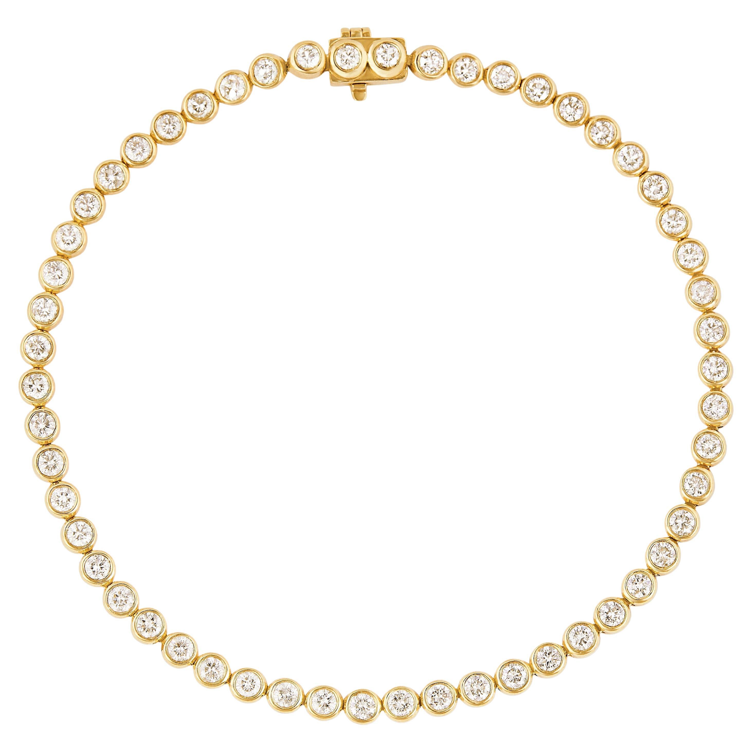 Diamant-Tennisarmband mit Lünette aus 18 Karat Gelbgold von Allison Bryan
