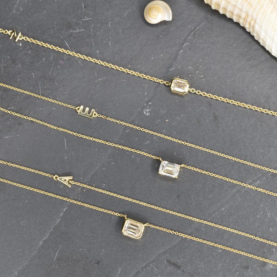 Bezel Set Emerald Cut 18K Gold Diamond Necklace In New Condition For Sale In Los Angeles, CA