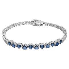 Armband in Herzform mit blauem Saphir in Lünette 14K Weißgold 7 Zoll