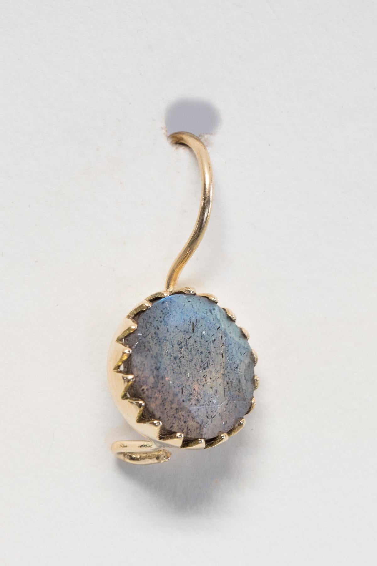 Pair of faceted labradorite with high quality translucence in a bezel-set 18K gold drop.  For pierced ears.  Wire hooks into catch at the bottom-back of the gem stone.