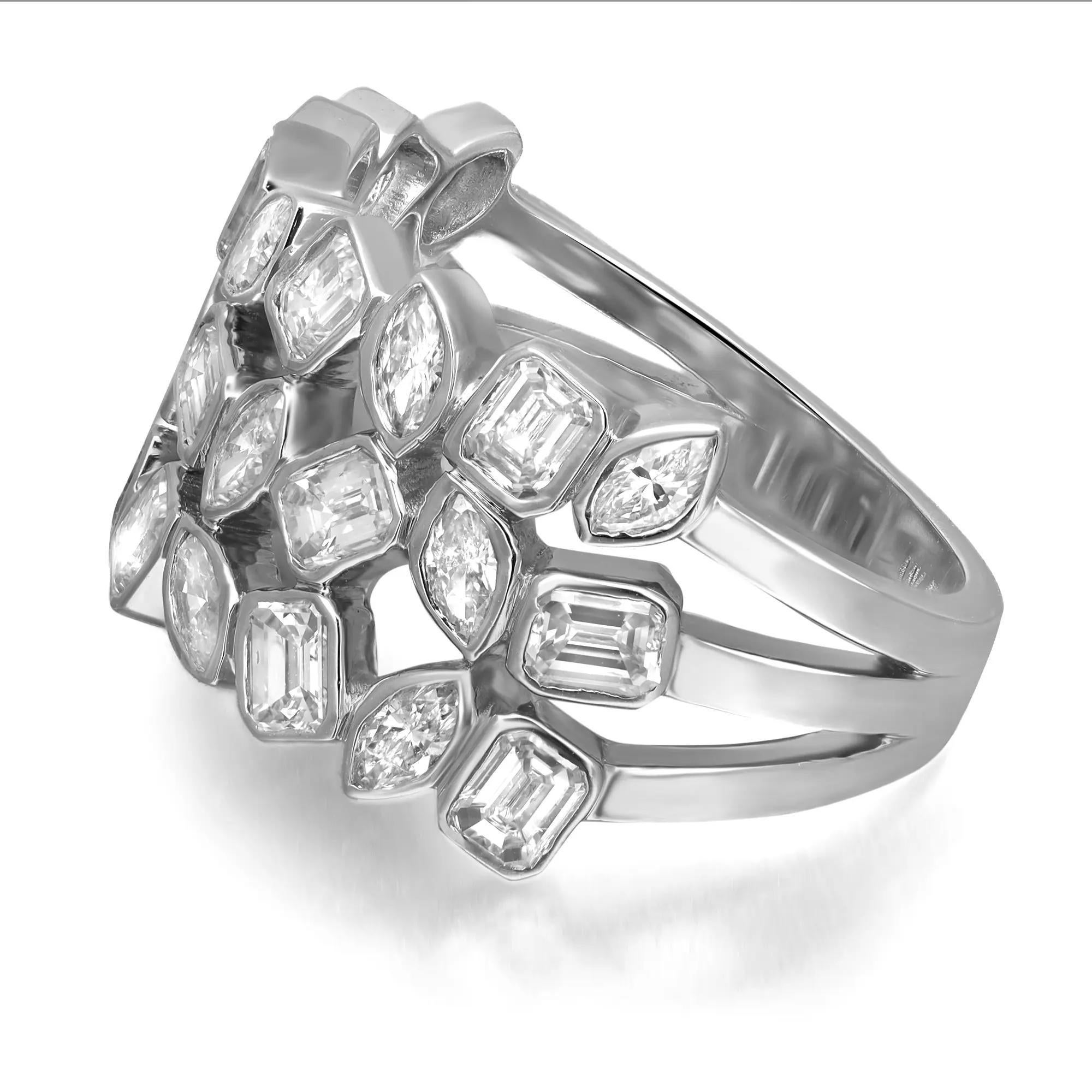 This stunning diamond band ring is all about sparkle and glamour. Crafted in fine 14K white gold. This style features marquise and emerald cut shimmering diamonds in bezel setting. Total diamond weight: 2.59 carats. Diamond quality: H-I color and