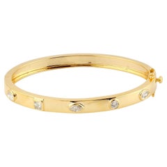 Bracelet en or jaune 18 carats serti de diamants multiformes