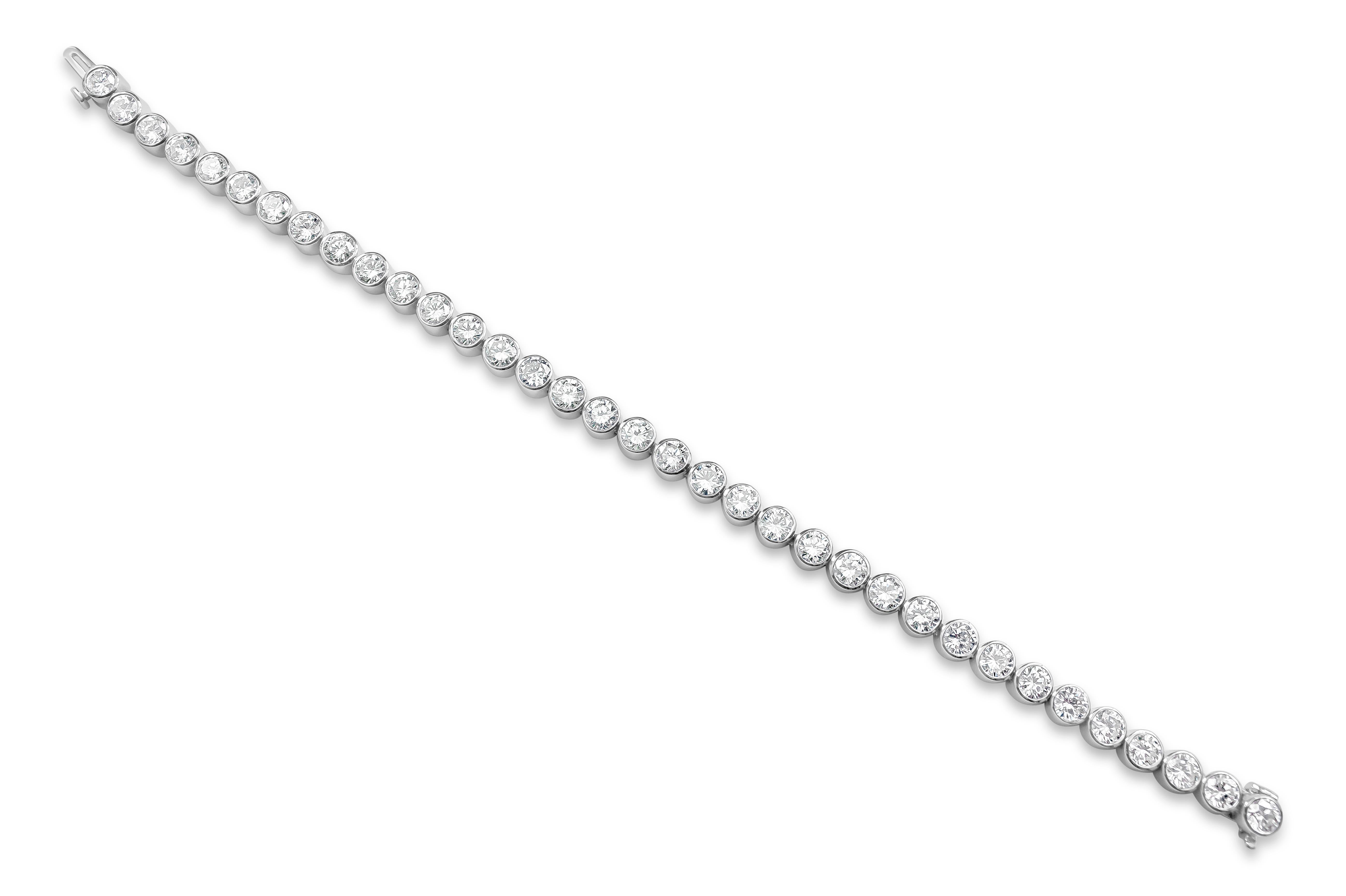 A classic tennis bracelet style set with round brilliant diamonds, Diamonds weigh 11.02 carat total, H-I color and VS1-SI1 in clarity. Bezel set in 18 karat white gold.

Roman Malakov is a custom house, specializing in creating anything you can