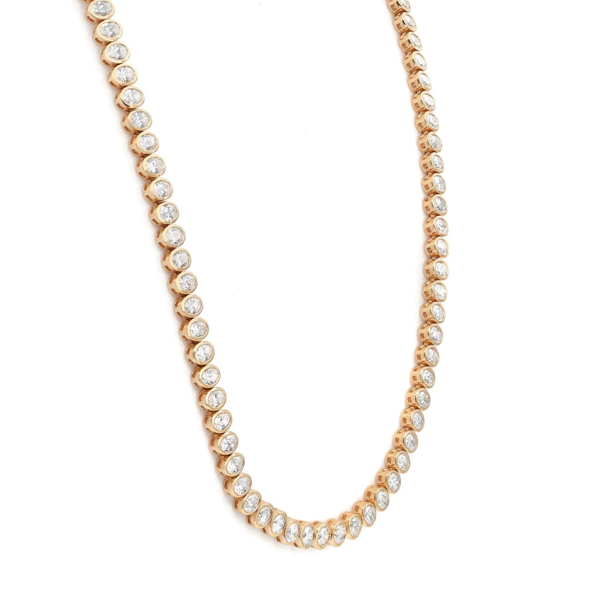 A classic diamond single-line tennis necklace is an iconic essential that always remains in fashion. This elegant and alluring necklace features 108 bezel set bright white oval cut diamonds weighing 14.76 carats in total. Crafted in 18K yellow gold.