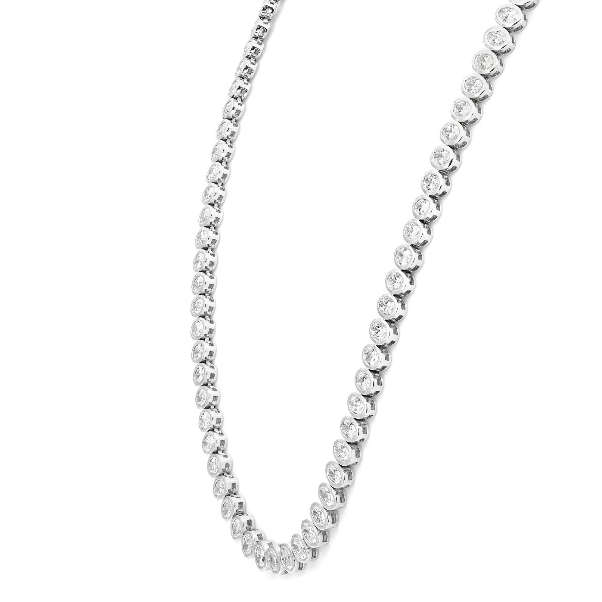 A classic diamond single-line tennis necklace is an iconic essential that always remains in fashion. This elegant and alluring necklace features 55 bezel set bright white oval cut diamonds weighing 7.94 carats in total. Crafted in 18K white gold.