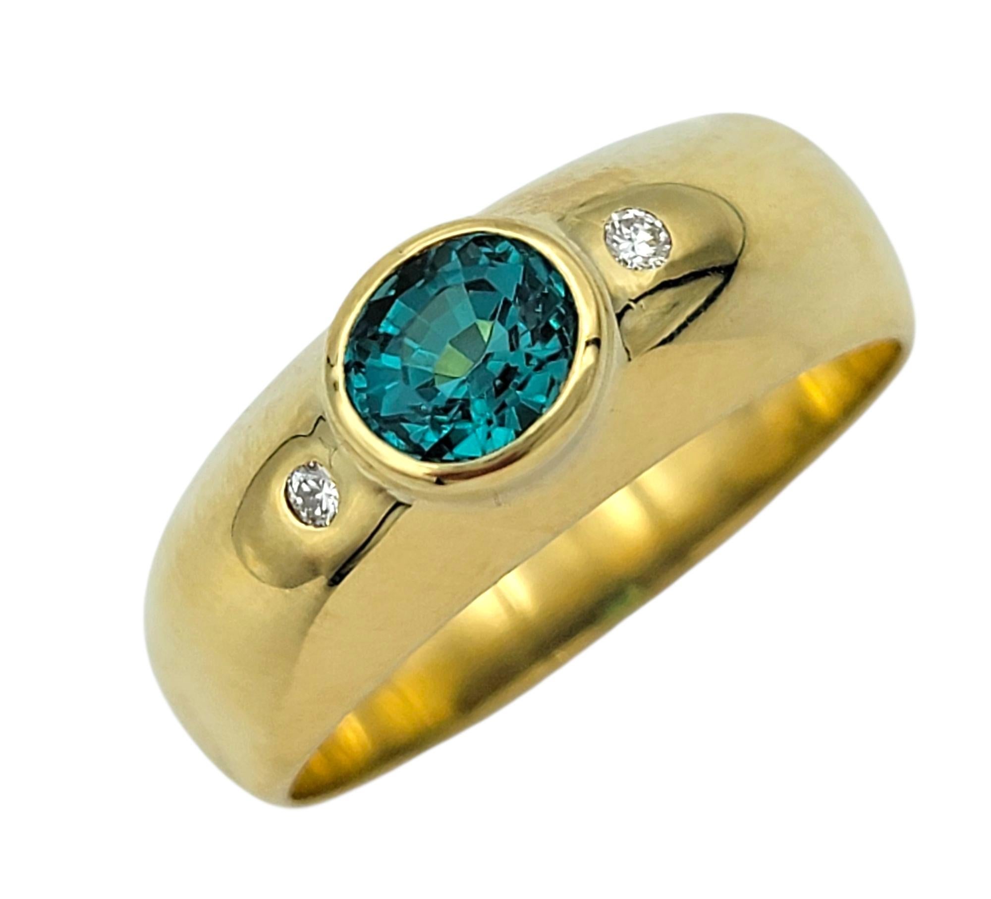 Contemporary Bezel Set Oval Paraiba Tourmaline and Diamond Band Ring in 18 Karat Yellow Gold For Sale