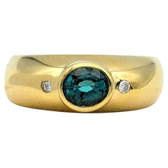 Bezel Set Oval Paraiba Tourmaline and Diamond Band Ring in 18 Karat Yellow Gold