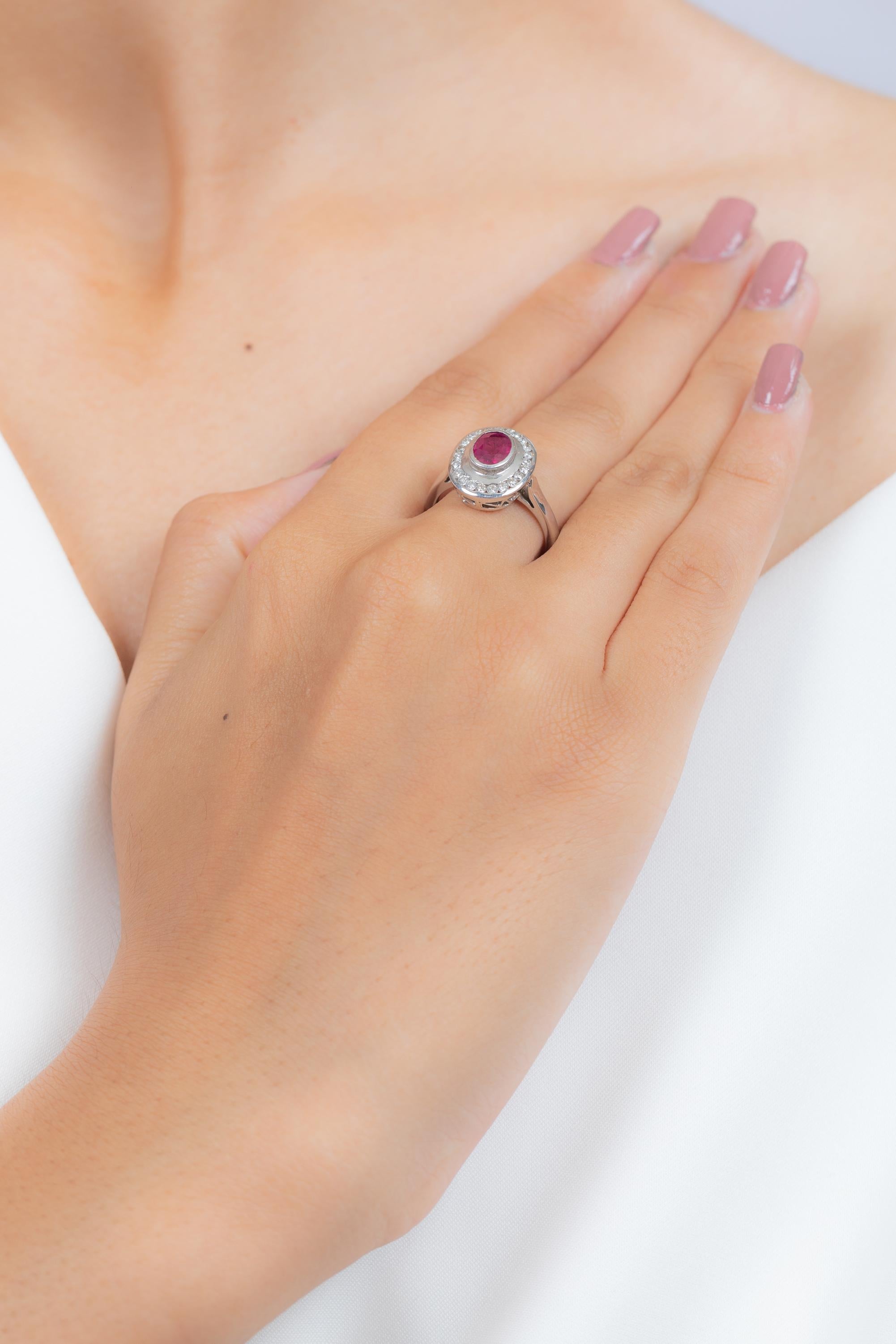 For Sale:  Bezel Set Oval Shape Ruby Diamond Cocktail Ring in 18K White Gold 7