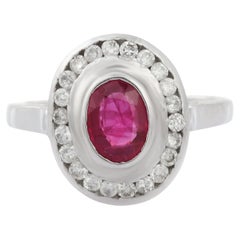 Bezel Set Oval Shape Ruby Diamond Cocktail Ring in 18K White Gold