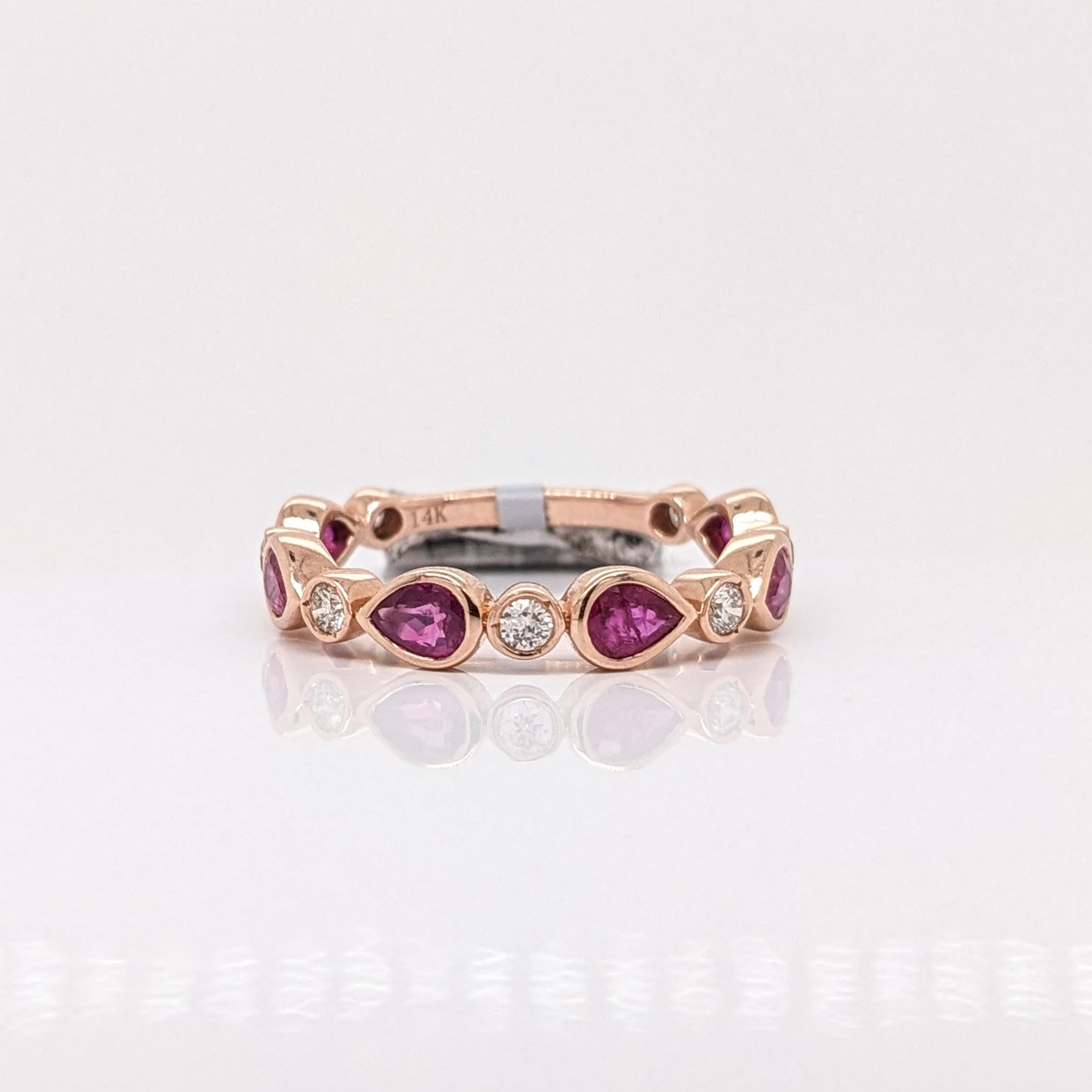 This exquisite 14K rose gold band ring is bezel set with red rubies and sparkling natural diamonds for a stunning look. A versatile piece of jewelry for any occasion.

Specifications

Item Type: Ring
Centre Stone: Ruby
Treatment: