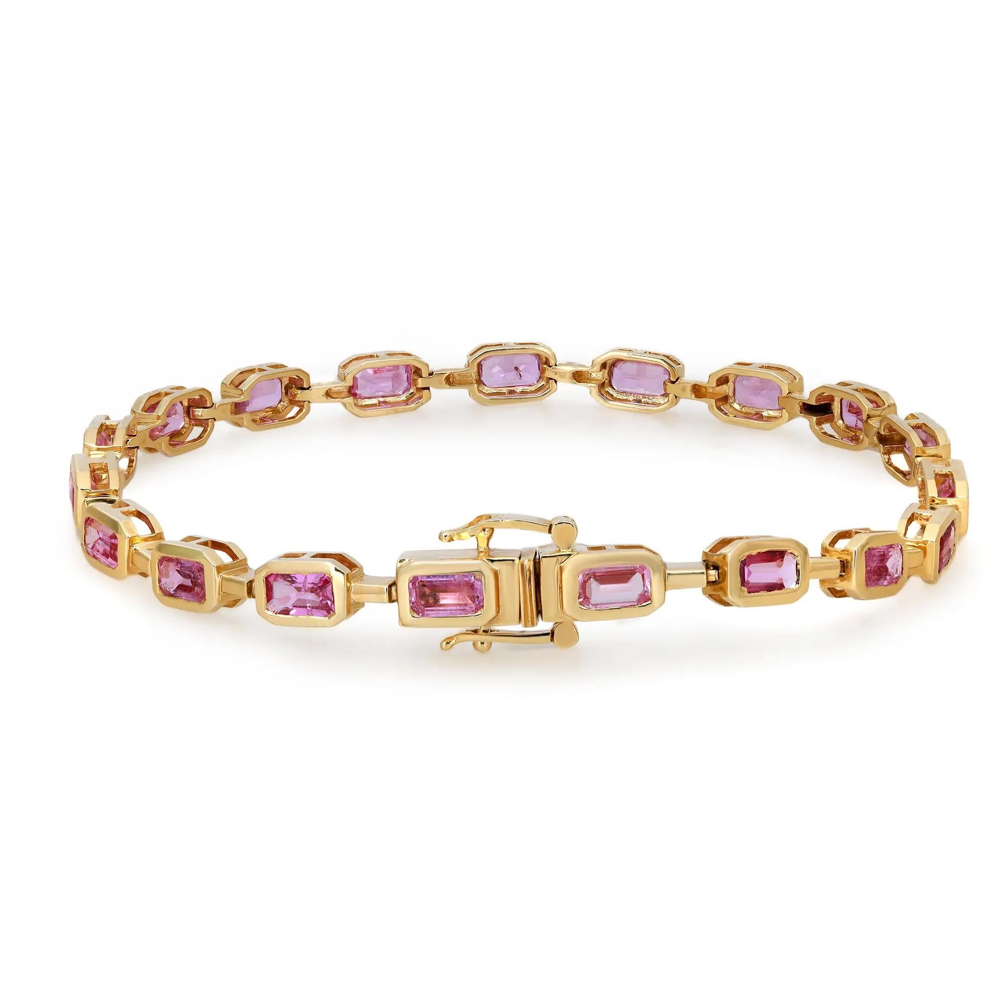 This beautiful pink sapphire tennis bracelet exudes sophistication. Crafted in lustrous 14K yellow gold, it features emerald cut pink sapphires studded in bezel setting. Total pink sapphire weight: 5.28 carats. Bracelet length: 7 inches. Width: