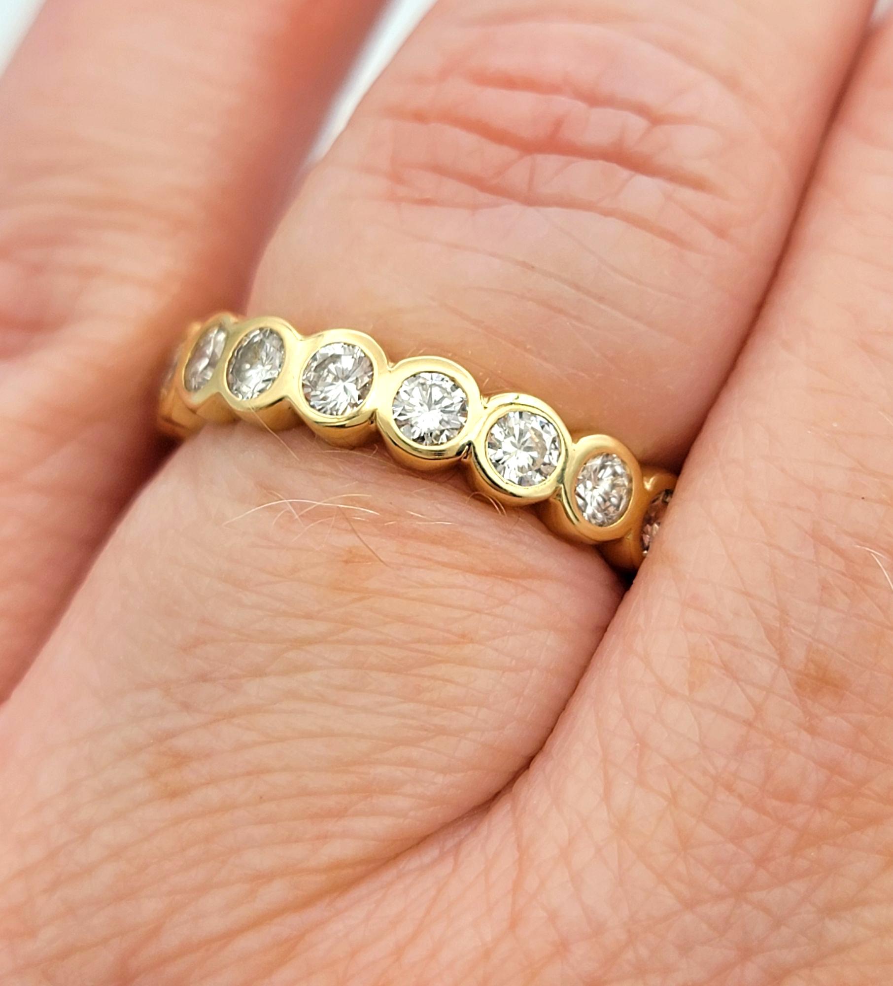 Bezel Set Round Brilliant Cut Diamond Eternity Band in 14 Karat Yellow Gold For Sale 2