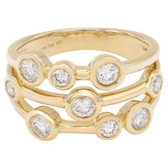 Anillo de fantasía con diamante de corte redondo engastado en bisel Oro amarillo de 18 quilates 0,69Cttw Talla 6,75