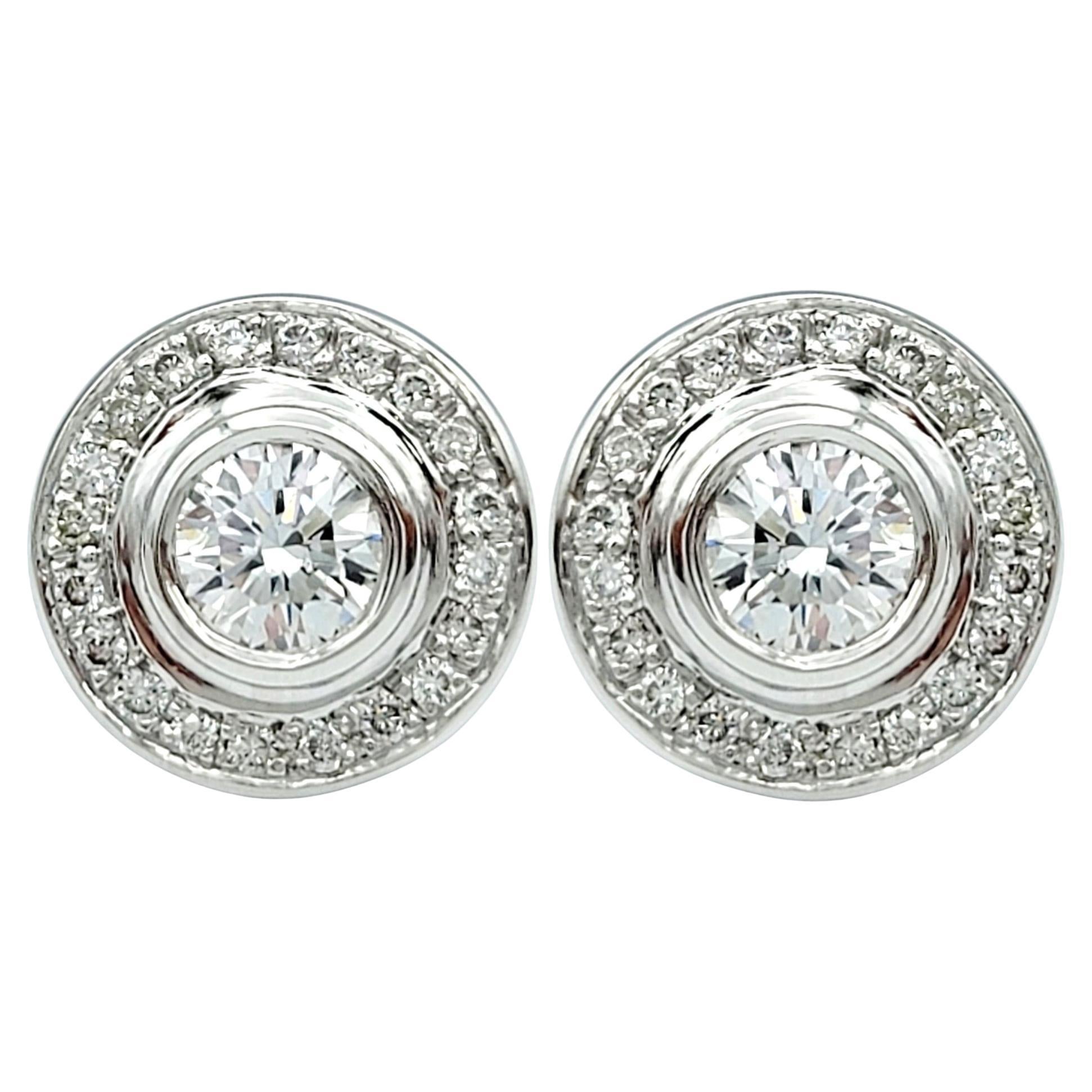 Bezel Set Round Diamond Halo Design Stud Earrings in 14 Karat White Gold