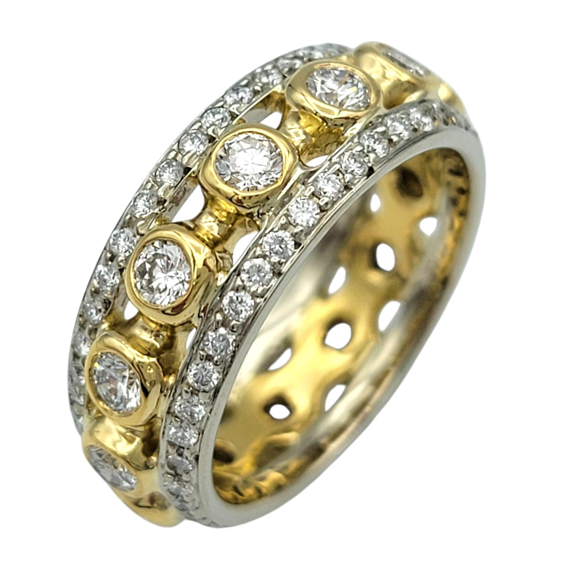 Ring Size: 6

This eye-catching ring features a bold three-row design that blends warm and cool tones for a striking contrast. The center row showcases a series of round brilliant diamonds set in rich yellow gold bezels, giving the piece a warm,