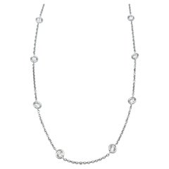 Bezel Set Round Diamond Station Necklace in 18 Karat White Gold